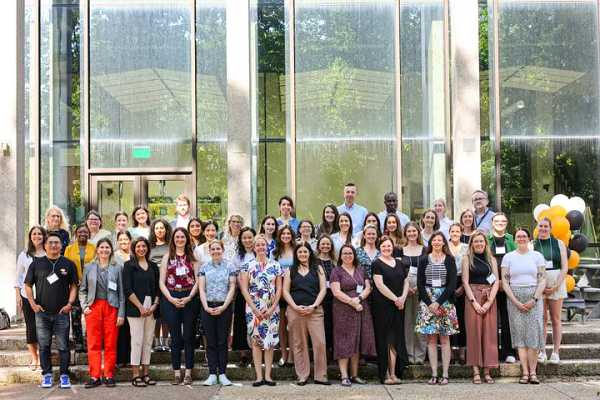 Photo of KT Canada Conference selected attendees and expert speakers standing in the courtyard of Dalhousie University in Halifax, Nova Scotia. DeBrittany Humphrey is standing in the second row, second from the left.